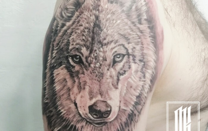 татуировка волк